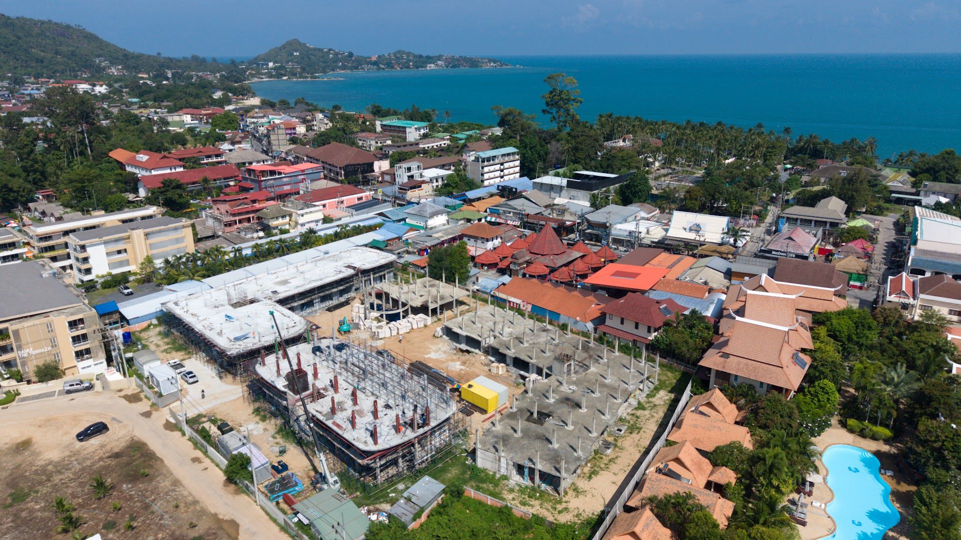 Coral Condo Samui construction site from above, with Lamai town and the Gulf of Thailand