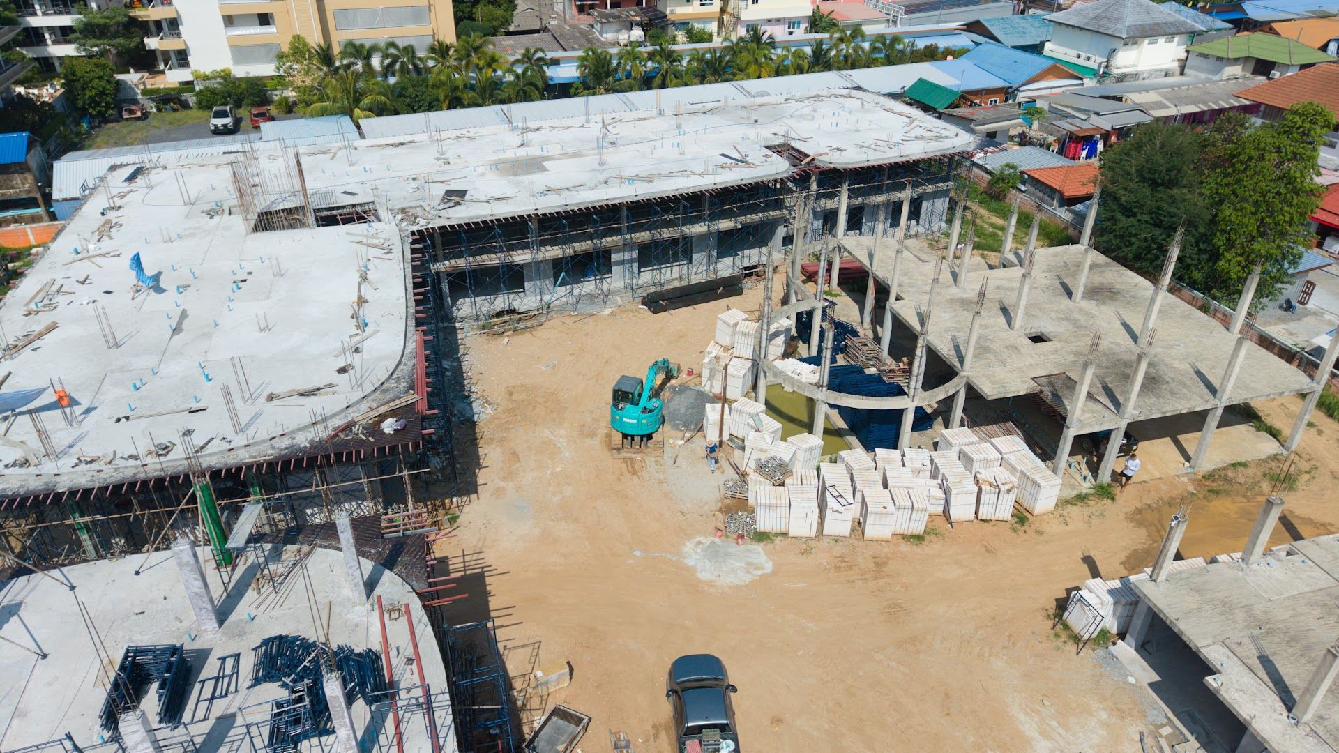 Wide aerial view of the Coral Condo Samui buildings under construction